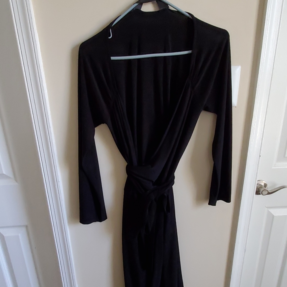 Super cute black wrap dress.